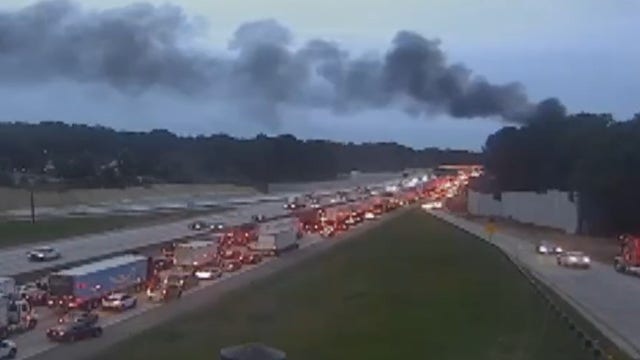 Multi-vehicle crash, fire temporarily shuts down I-285 south in DeKalb