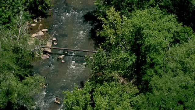 Firefighters rescue child after fall down embankment in Roswell