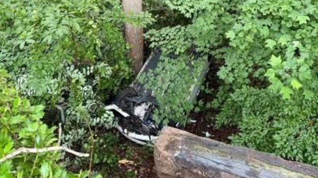 Crews rescue driver from upside-down vehicle in Sandy Springs ravine