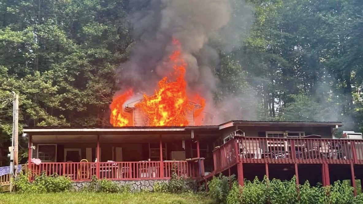 2 displaced after heavy flames engulf Ball Ground home