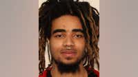 Suspect wanted after man found dead in Hampton wooded area