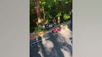 Driver saved after vehicle goes down Sandy Springs embankment
