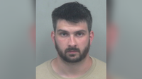Man arrested after Lawrenceville business bomb threat