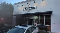 Firefighters stop flames from spreading at Roswell strip mall
