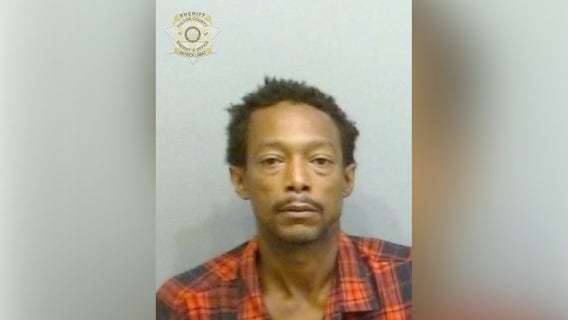 Man arrested after body found underneath southwest Atlanta bridge