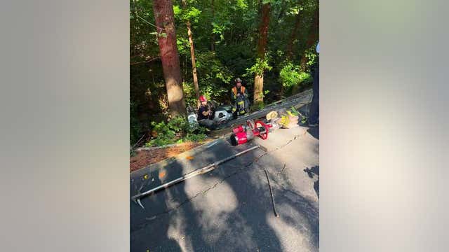 Driver saved after vehicle goes down Sandy Springs embankment