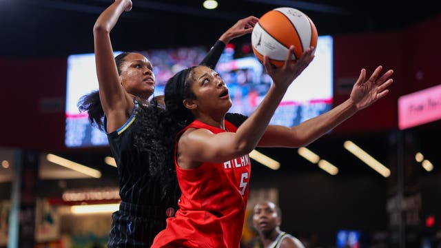Angel Reese leaves Atlanta Dream game with leg injury