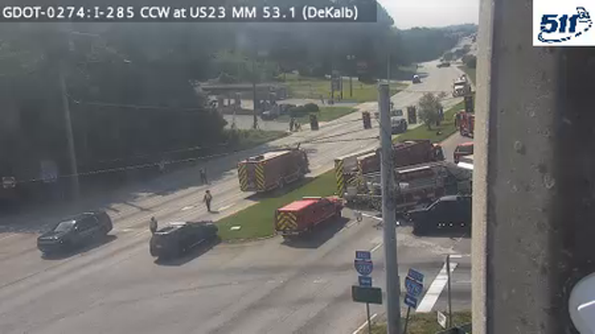 Overturned truck leaks fluid on Moreland Avenue at Thurman Drive