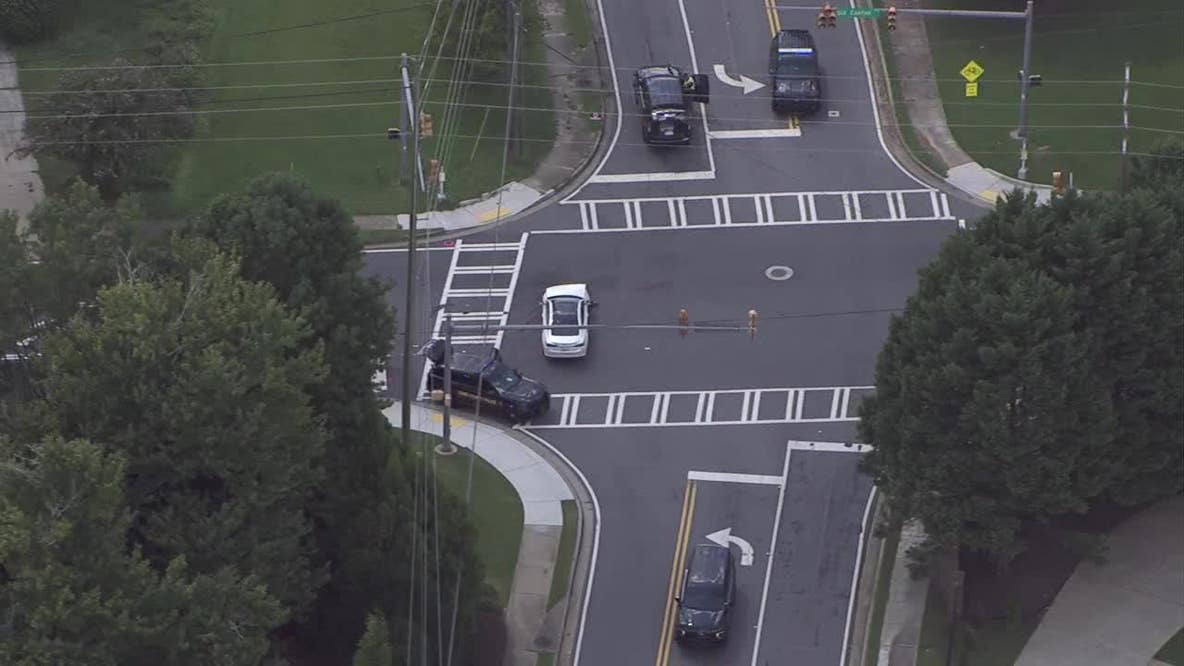Officer hospitalized, Old Canton Road shut down after patrol car crash