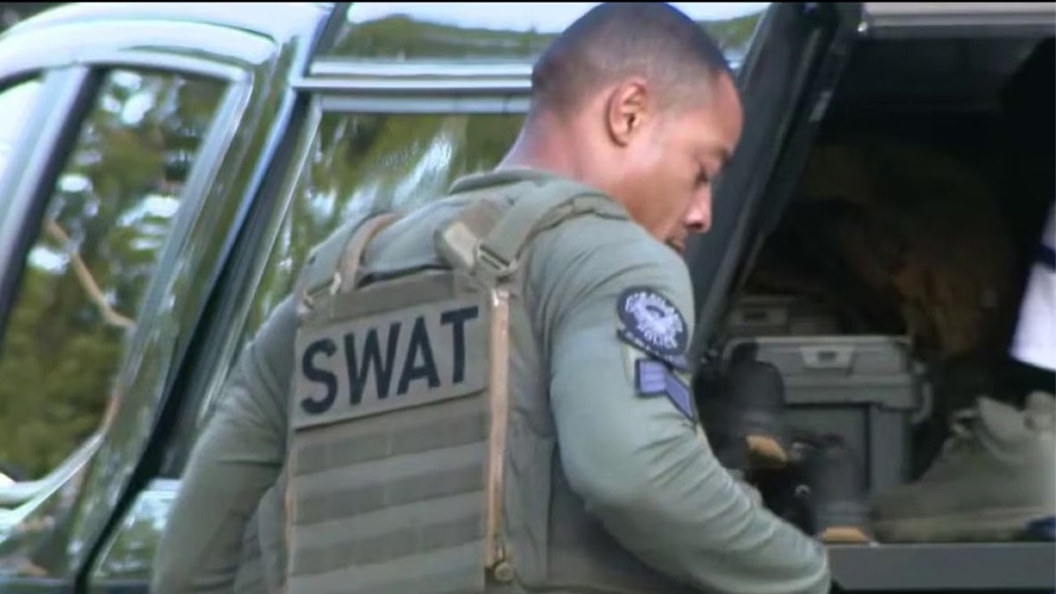 Explosives end tense 14-hour southwest Atlanta standoff