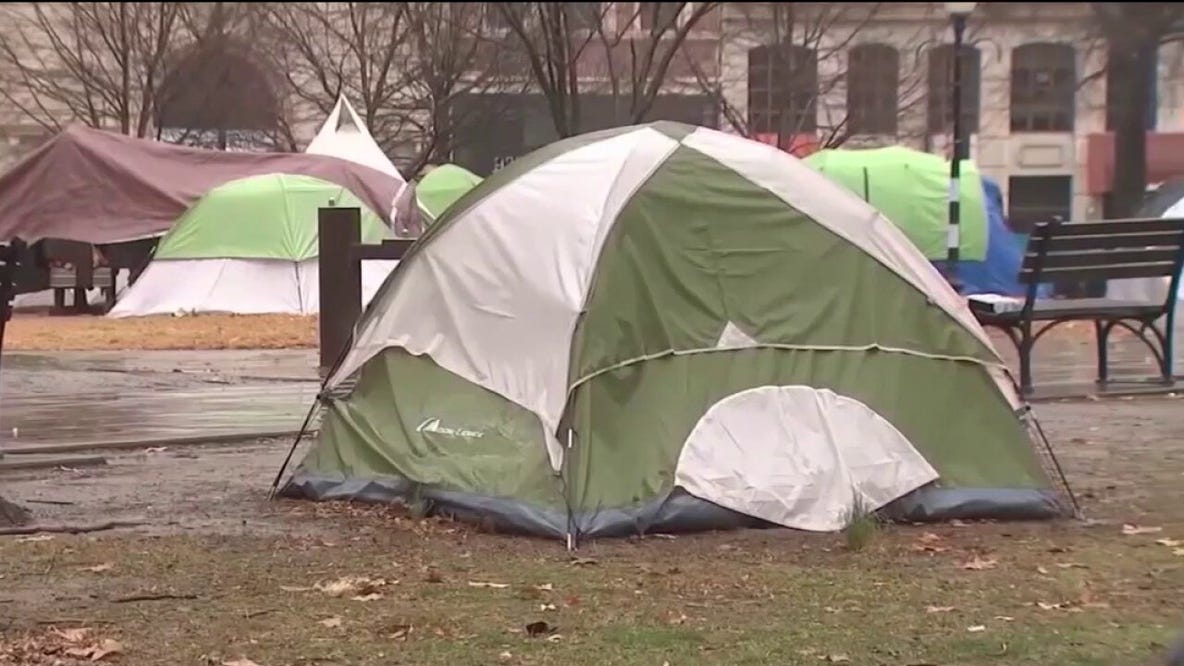 DeKalb County delays camping ban after tense board debate