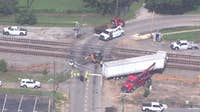 Train vs tractor-trailer crash shuts down Henry County intersection