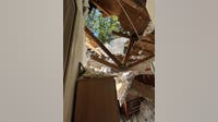 Massive tree crashes into Monroe home, displacing family