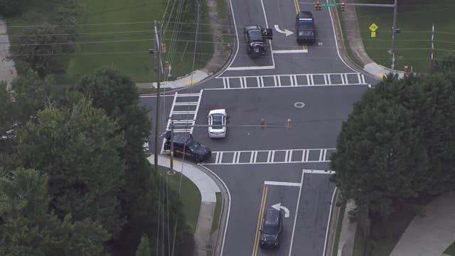 Officer hospitalized, Old Canton Road shut down after patrol car crash