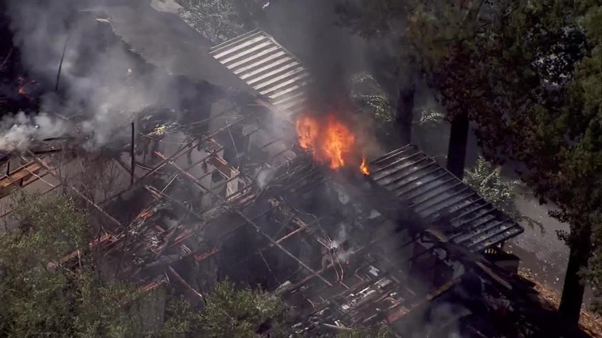 Ladder trucks battle flames at Roswell apartment complex