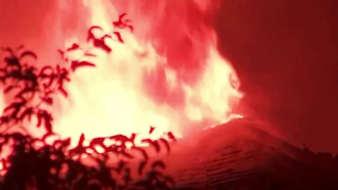 Flames shoot from roof of west Atlanta home early Friday morning