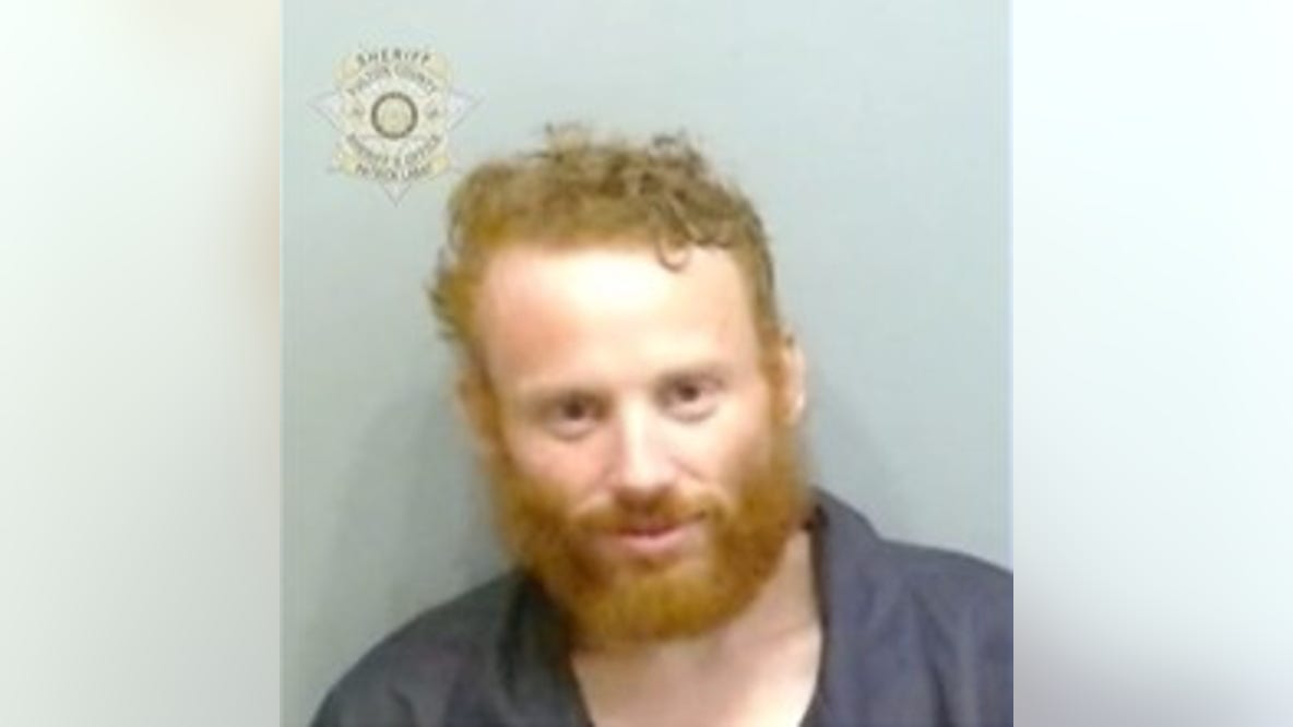 Man arrested on porch after trying to enter Atlanta homes