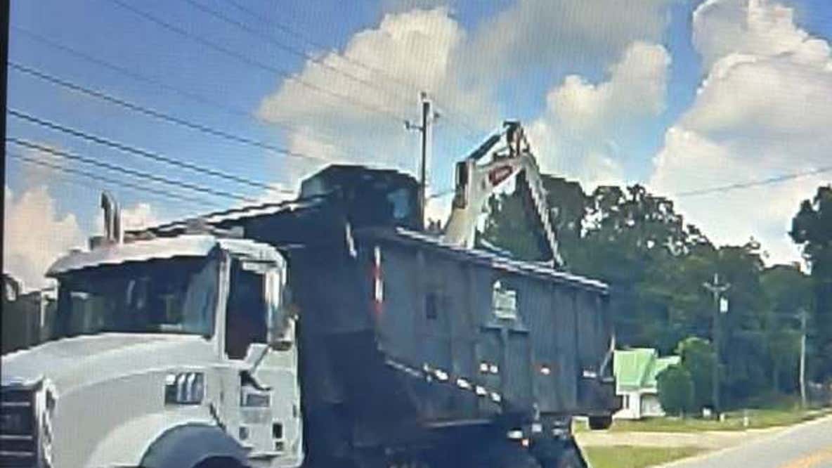 Man arrested after truck downs power line in Social Circle, police say