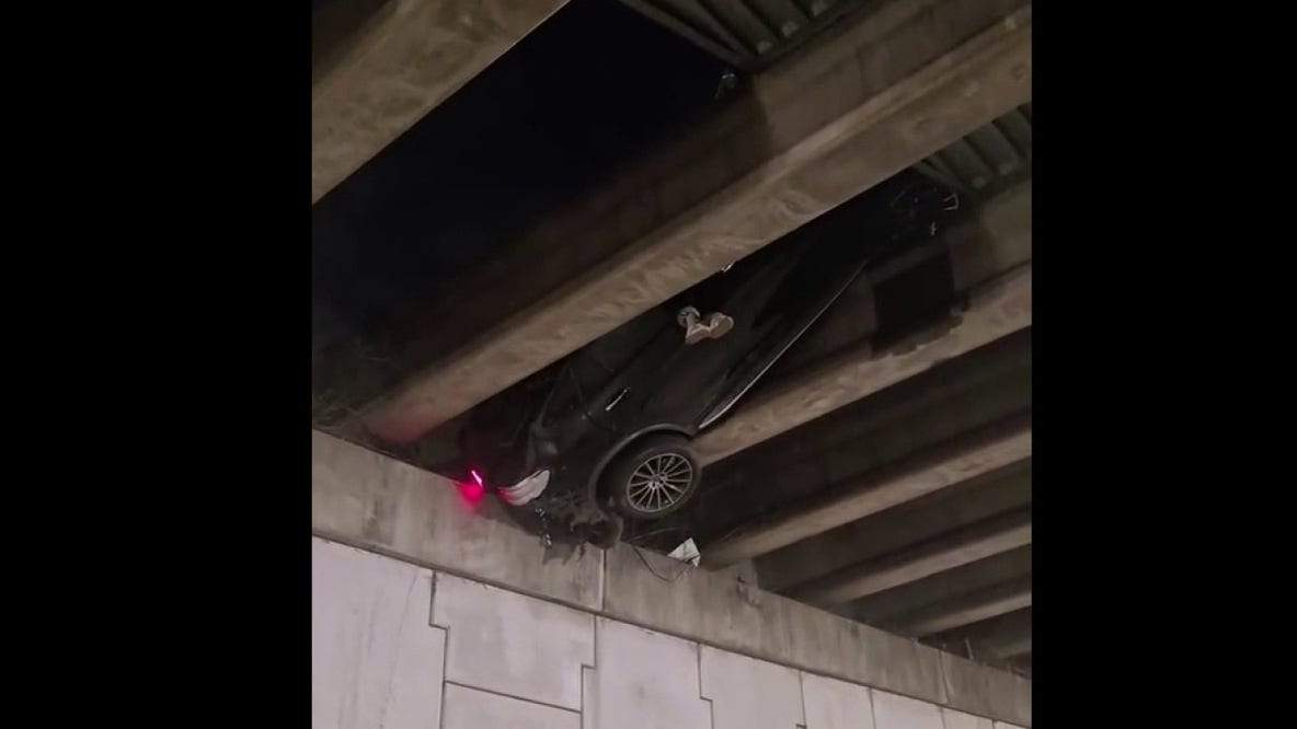 Wild video shows person dangling after I-20 crash in Atlanta