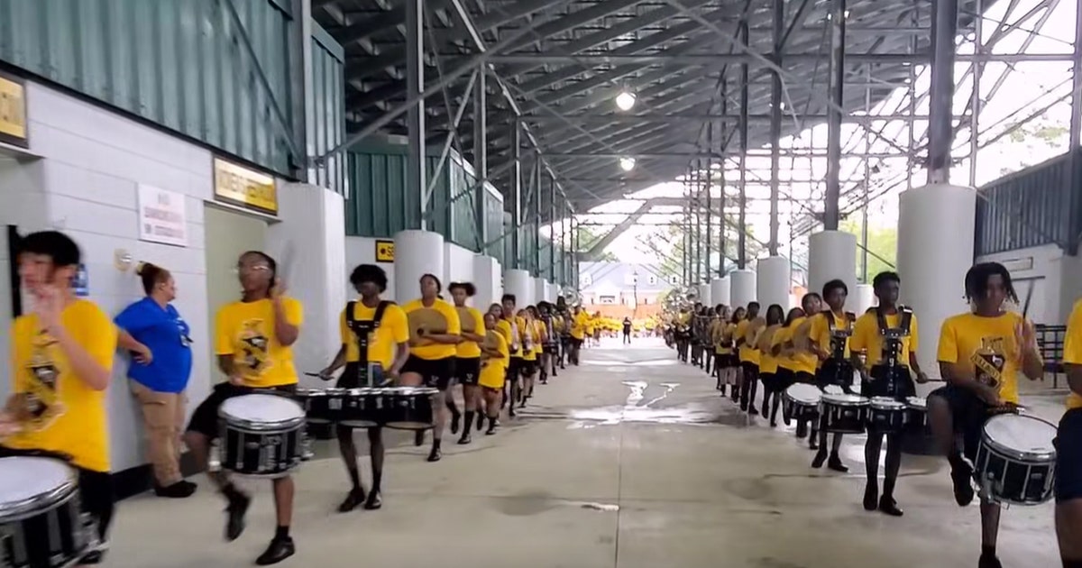 Watch: Band director stops halftime performance to deliver life