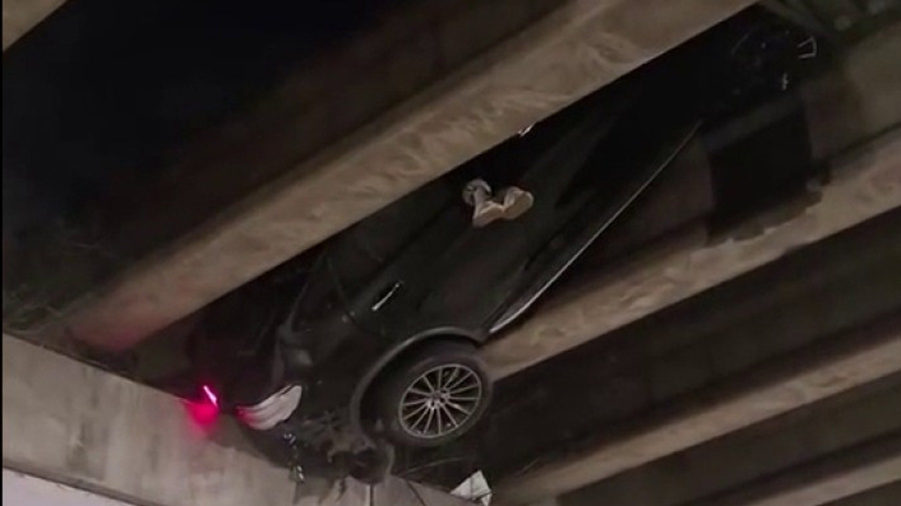 Wild video shows person dangling after I-20 crash in Atlanta