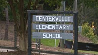2 charged after gun, tent found near Snellville elementary school
