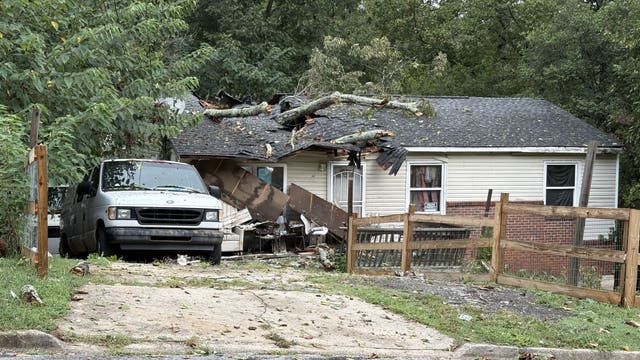 Tree comes down on southeast Atlanta home as storms blow through