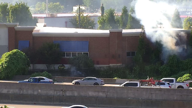 Brush fire breaks out near Goodwill on Piedmont Road, officials say