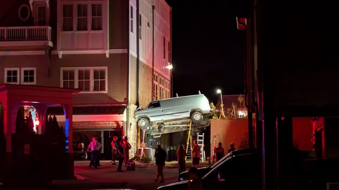 Van left suspended in air after downtown Acworth crash
