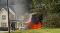 Firefighters stop garage fire from destroying Cherokee County home