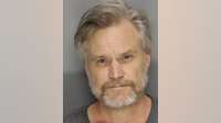 Atlanta man accused of firing shotgun at Acworth motel door