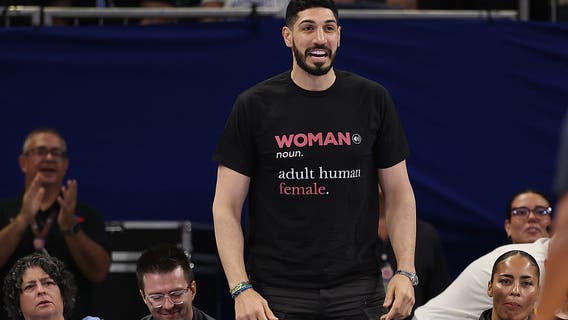 Former NBA player Enes Kanter Freedom escorted from State Farm Arena