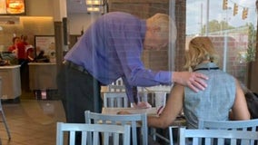 Photographer catches Chick-fil-A worker praying over customer