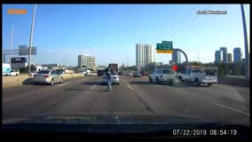 Dash camera captures Lime scooter rider on I-35 in downtown Dallas during rush hour