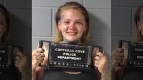 Mom accused of leaving infant in running car, taking shots in nightclub, police say