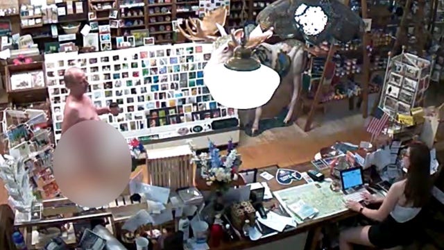 Video shows man casually entering cafe naked to get a cup of coffee