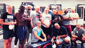 College football players shave heads to stand in solidarity with beloved coach battling cancer