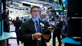 Stocks fall sharply after bond market warns of recession