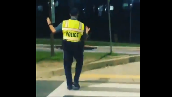 Howard County cop shows off his salsa dancing moves in Columbia crosswalk