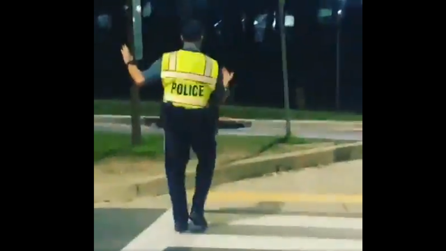 Howard County cop shows off his salsa dancing moves in Columbia crosswalk