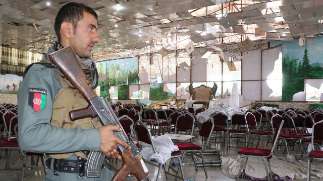 Islamic State claims bombing at Kabul wedding that killed 63
