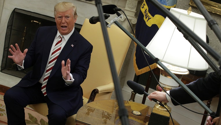 WASHINGTON, DC - AUGUST 20: U.S. President Donald Trump speaks to members of the media as he meets with President of Romania Klaus Iohannis in the Oval Office of the White House August 20, 2019 in Washington, DC. This is Iohannis’ second visit to the Trump White House and the two leaders are expected to discuss bilateral issues during their meeting. (Photo by Alex Wong/Getty Images)