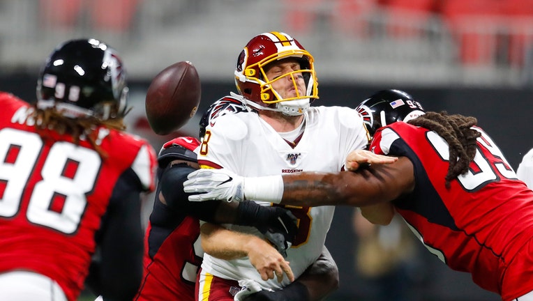 Haskins leads Redskins past fumbling Falcons, 19-7