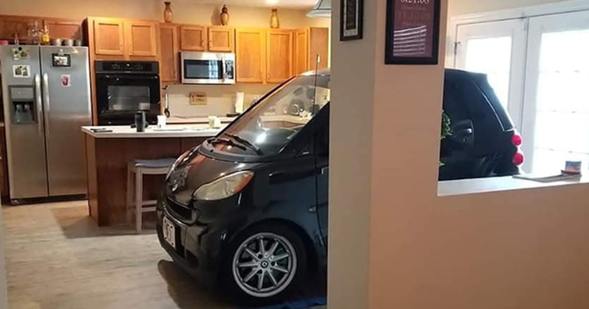 Florida man parks Smart car in kitchen so it won't blow away