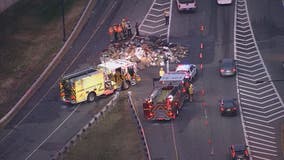 Trash truck fire spreads garbage along westbound lanes of the Dulles Access Road causing delays