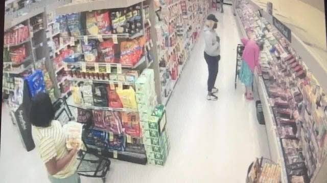 Suspects work together to steal wallet from elderly woman at store