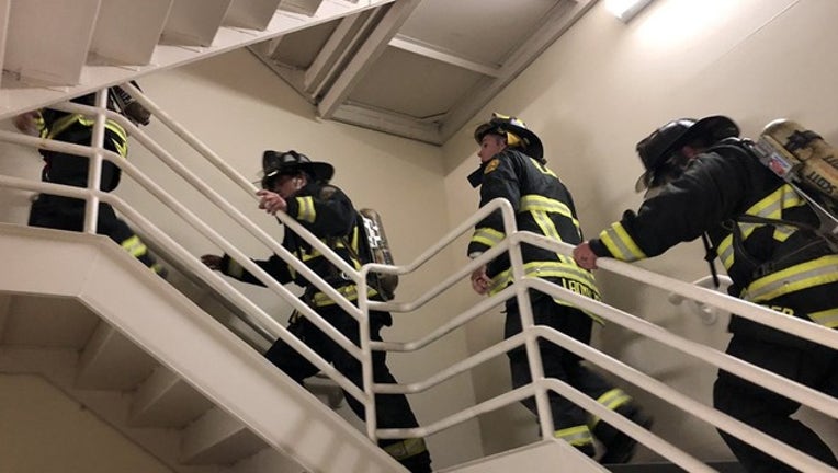 Orlando Firefighters Climb 110 Flights Of Stairs To Honor
