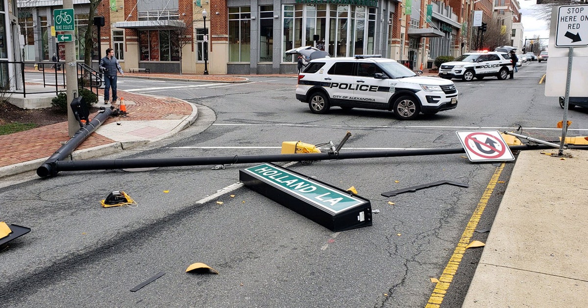 Strong winds bring temps below zero, take down power lines, poles in ...