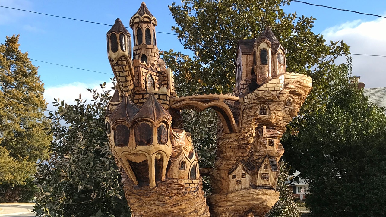 Arlington tree transformed into enchanted castle by local chainsaw artist