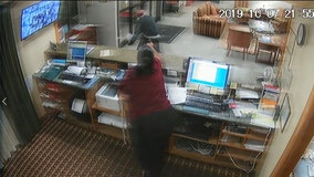 Hotel clerk manages to grab weapon from armed robber, sends him running at gunpoint